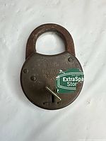 Front view of Protecto padlock with key inserted
