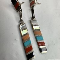 front view showing multicolour inlay and dangle design