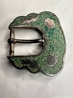 Front view of green enamel silver-plated belt buckle showing enamel pattern and overall wear