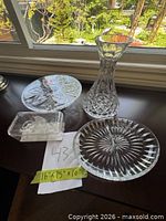 All items grouped: vase, platter, cake stand, lidded dish, hooks