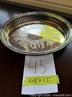 Top view showing full tray with engraved design and size note
