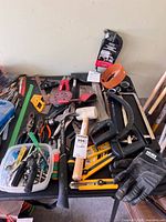 Overview of assorted hand tools on table