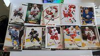 Overview of sample cards from the lot showing various teams and brands