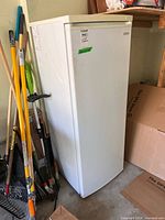 Front right three-quarter view of freezer showing full exterior and size reference