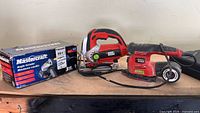 All three corded power tools lined up with Mastercraft box