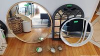 Group shot of all mirrors standing against wall