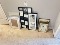 Group view of all frames leaning against wall