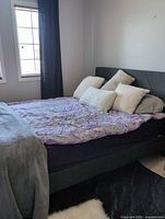 Complete bed with bedding and pillows