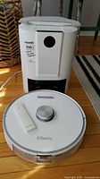 Robot vacuum, auto-empty dock, remote and power cable