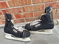 Overall view of both Bauer skates side by side