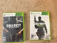 Front covers of both Xbox 360 game cases