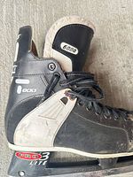 Left skate side view showing model markings and wear