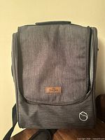 Front view showing Freebore logo patch, white outline logo, overall fabric texture