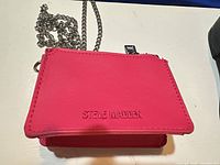 Front view pink Steve Madden mini wallet crossbody