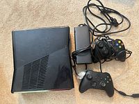 Top view of console, power brick and two controllers