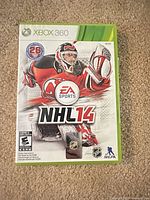 Front cover of NHL 14 Xbox 360 case