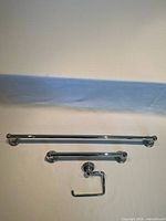 Full view of 26.5 in towel bar, 14 in towel bar, and 5.5 in toilet paper holder