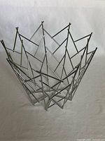 angled side view of stainless steel geometric bowl