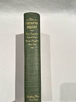 Spine view showing title, publisher and cloth cover