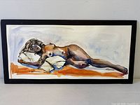 Full view of watercolor painting on black mat board