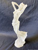 Front view of frosted lucite nude lady sculpture