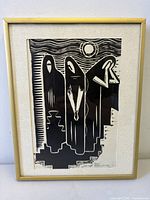 Frontal view of framed linocut print showing full artwork and frame