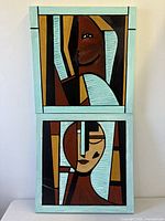 Both abstract paintings stacked
