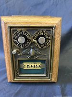 front view showing postal door, dials, eagle emblem, glass window with 3949