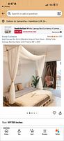 Screenshot showing Comtelek white bed canopy on bed