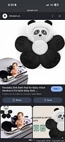 Stock image of panda-shaped baby sink bath cushion with infant demonstrating usage