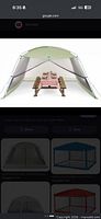 Angled manufacturer image showing screen house over picnic table