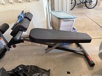 Side view of bench showing adjustable backrest and steel frame