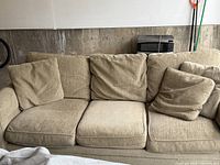 front view of sofa showing cushions and pillows
