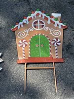 Gingerbread house stake showing candy and frosting details