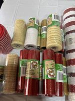 Close of small sparkle tulle spools with labels