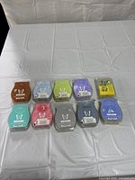 All ten wax melt packages laid out on table
