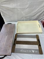 Overview of three trays on table