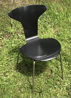 Front left view of black Mosquito chair with steel legs