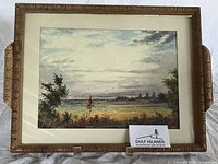 Front view of framed watercolour landscape under glass