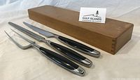 Knife, fork, honing steel with wood case