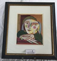 Front view of framed Picasso Woman by a Window print with mat and frame