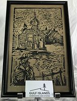 Full view of framed embossed artwork
