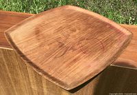 Top view of square teak tray showing drink stains and wood grain