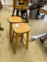 Two wooden bar stools full view