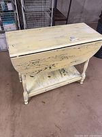 Full view of side table with one leaf down