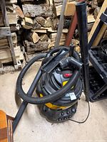Full view of Shop-Vac with hose, extension wand and nozzle