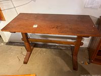 Entire table top and base visible