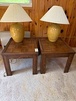 both end tables with lamps displayed
