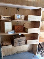 Shelf with multiple branded wooden crates
