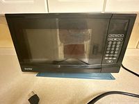 Front view showing brand logo and keypad layout
